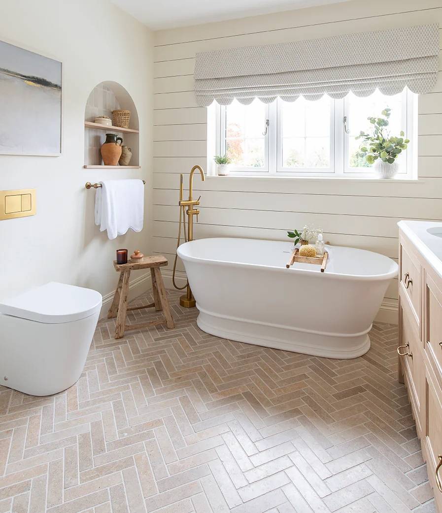 Textured Stone or Herringbone Tile Flooring in a Bathroom